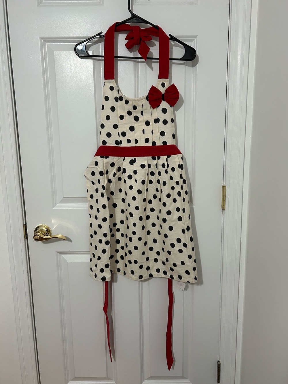 Anthropologie polkadot apron with bow